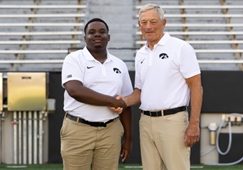 Endy Pierre with Kirk Ferentz.