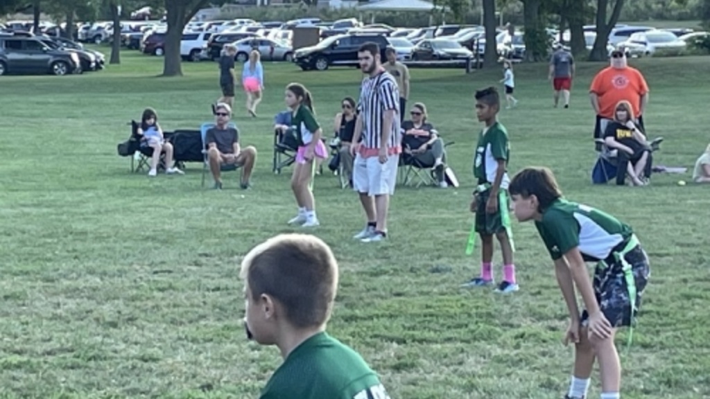 This is a picture of children playing flag football